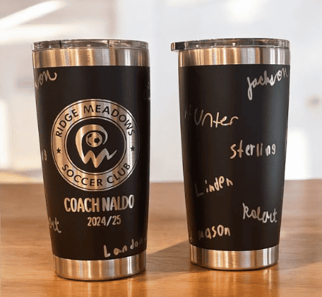 Customized chalkboard tumbler with handwritten sports and seasonal themes.