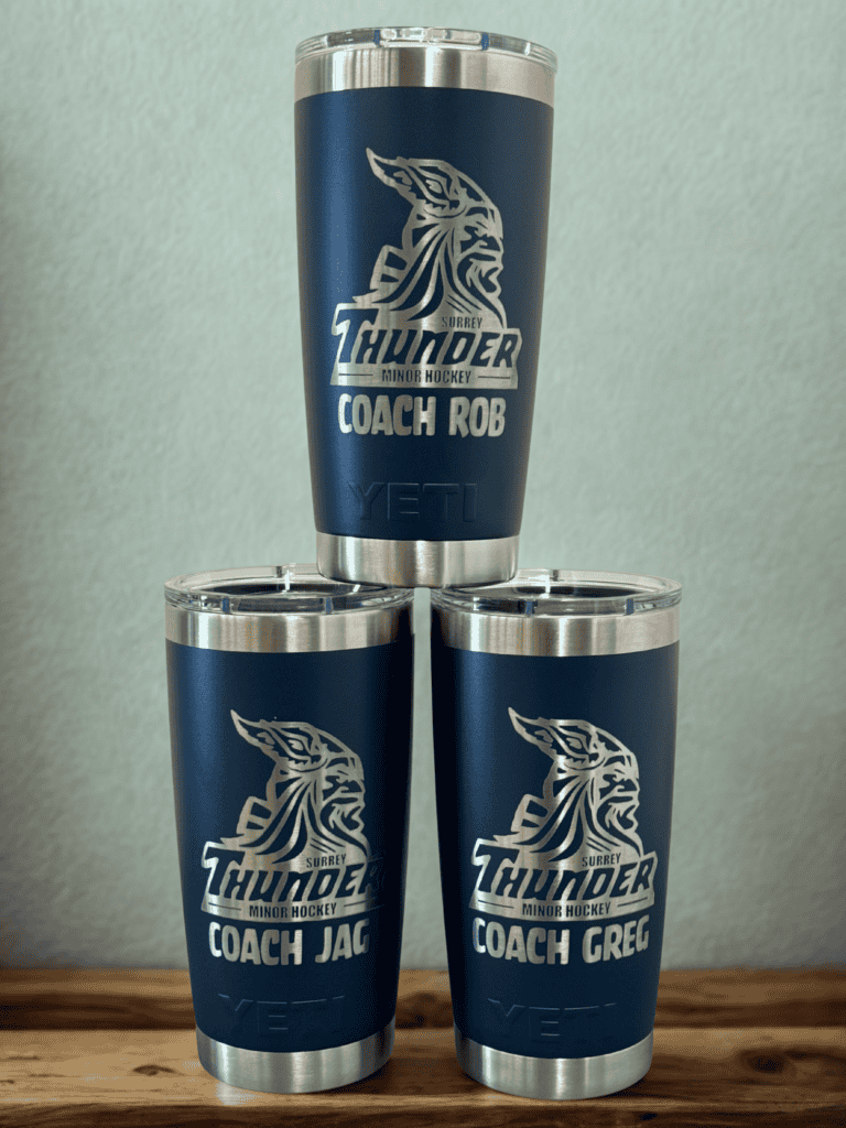 Custom hockey tumblers with team logo and personalized coach names, perfect for sports fans and team support.